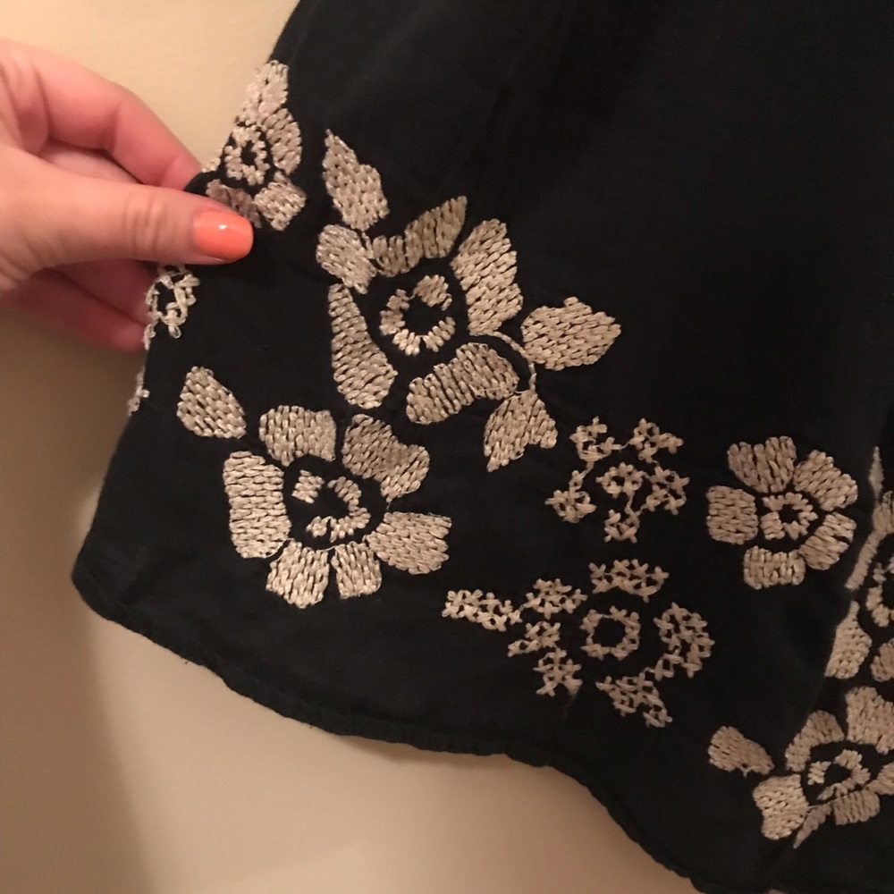 flowy tank top with embroidered flowers